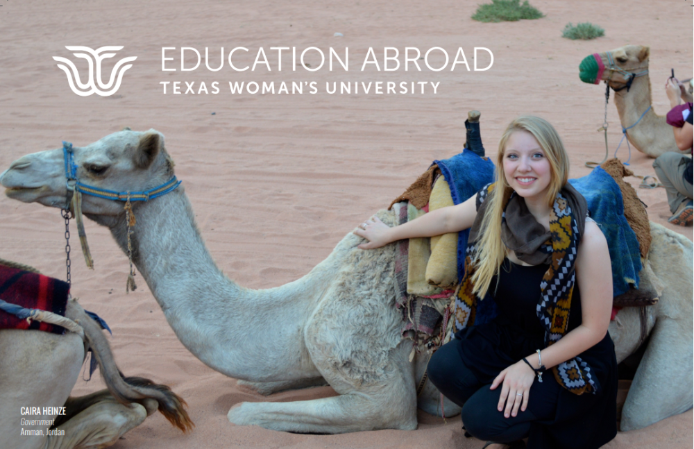Student sits with camel